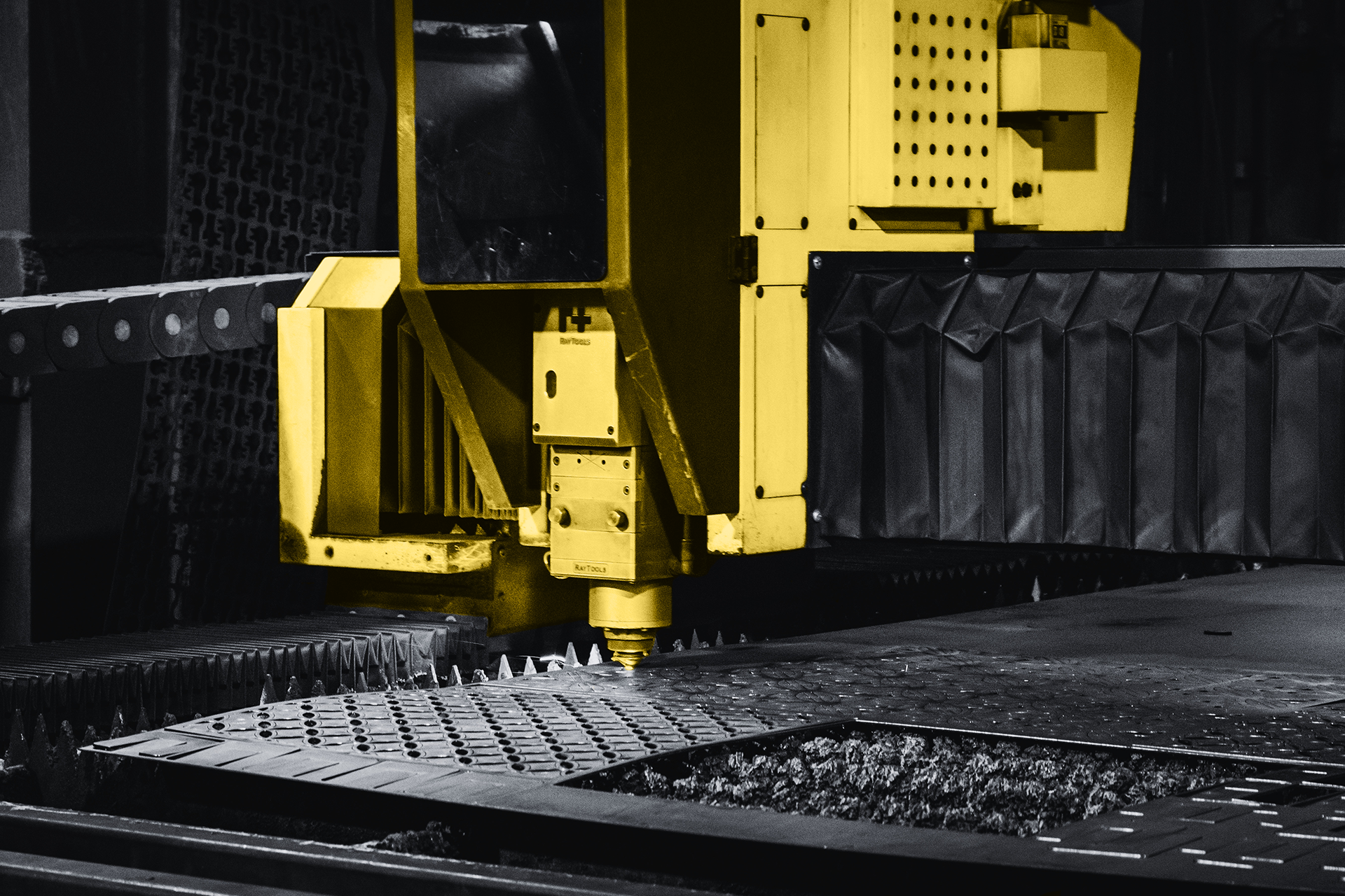 CNC laser cutting machine with industrial control system, representing obsolete CNC controllers and replacement parts for Siemens and Fanuc equipment