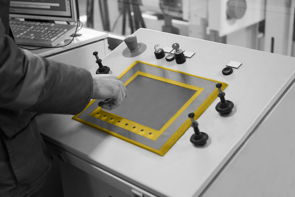 Obsolete industrial HMI panel with blank screen on control console, representing discontinued Siemens and Allen Bradley operator interface replacements